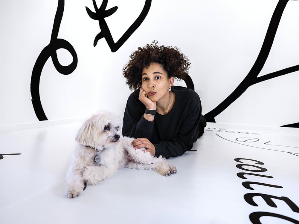 Shantell Martin and her small white dog, Blanche