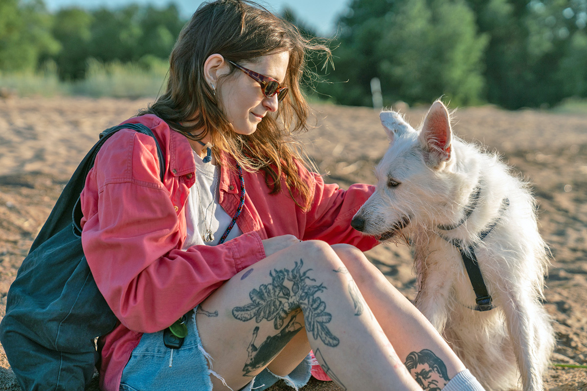 person with a white dog