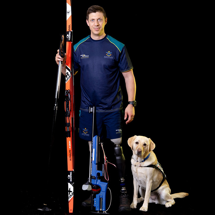 David Miln with his service dog, Suki