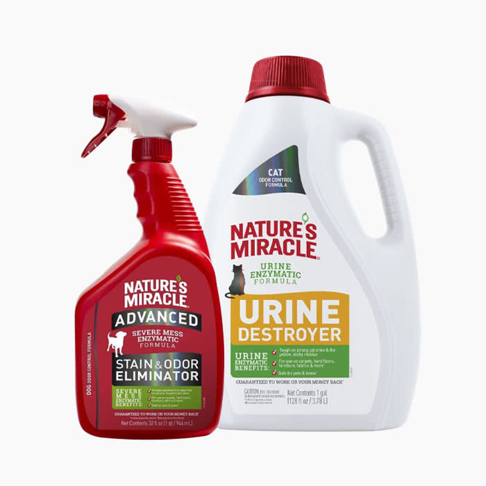 two nature's miracle urine destroyer products in white and red bottles