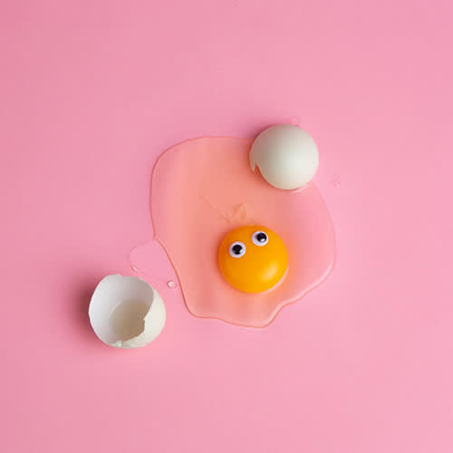 pink background with egg on it