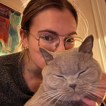 woman with British shorthair cat