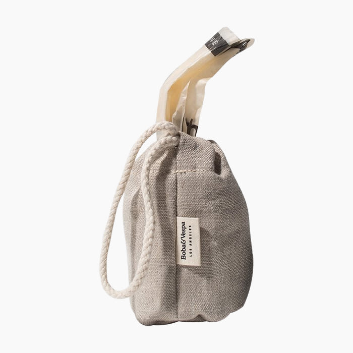 poop bag holder in grey linen sack