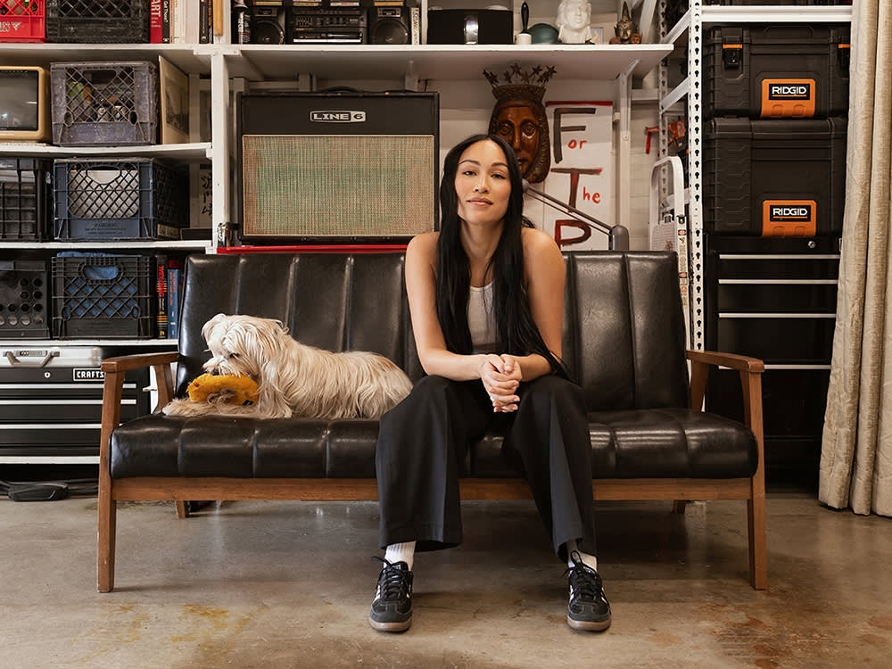 Stephanie Shepherd and her white dog, Binx