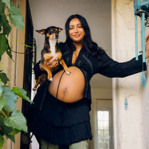 Amrit Tietz poses with her dog, Soy.