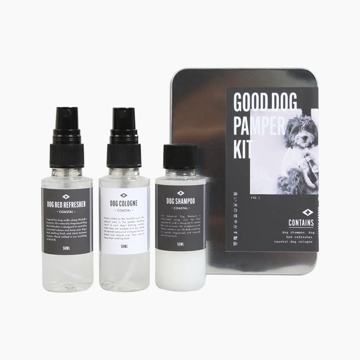 dog grooming kit with three bottles