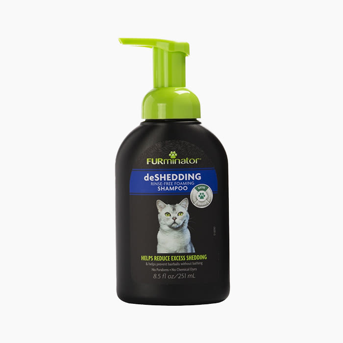 cat rinse in brown bottle with green top