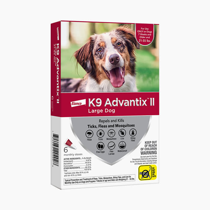 the flea and tick treatment with a dog on the box