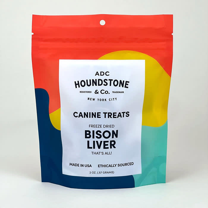 dog treats in red yellow and blue bag