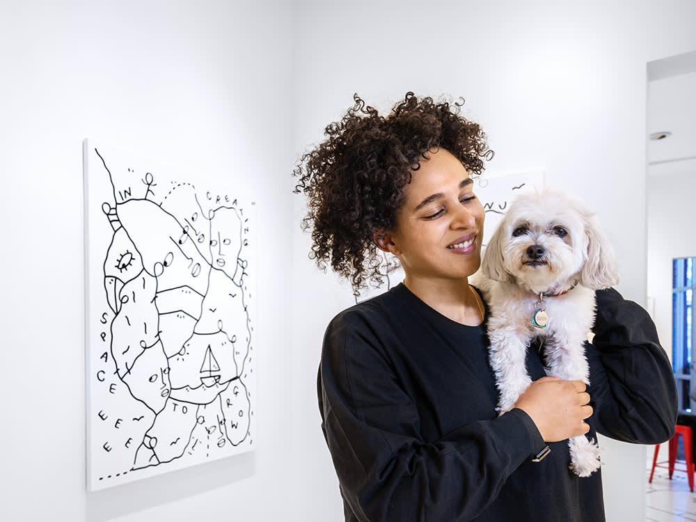 Shantell Martin and her small white dog, Blanche