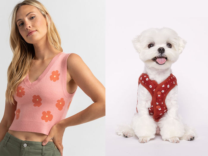 a woman in a pink floral vest, a fluffy white dog in a red floral vest 