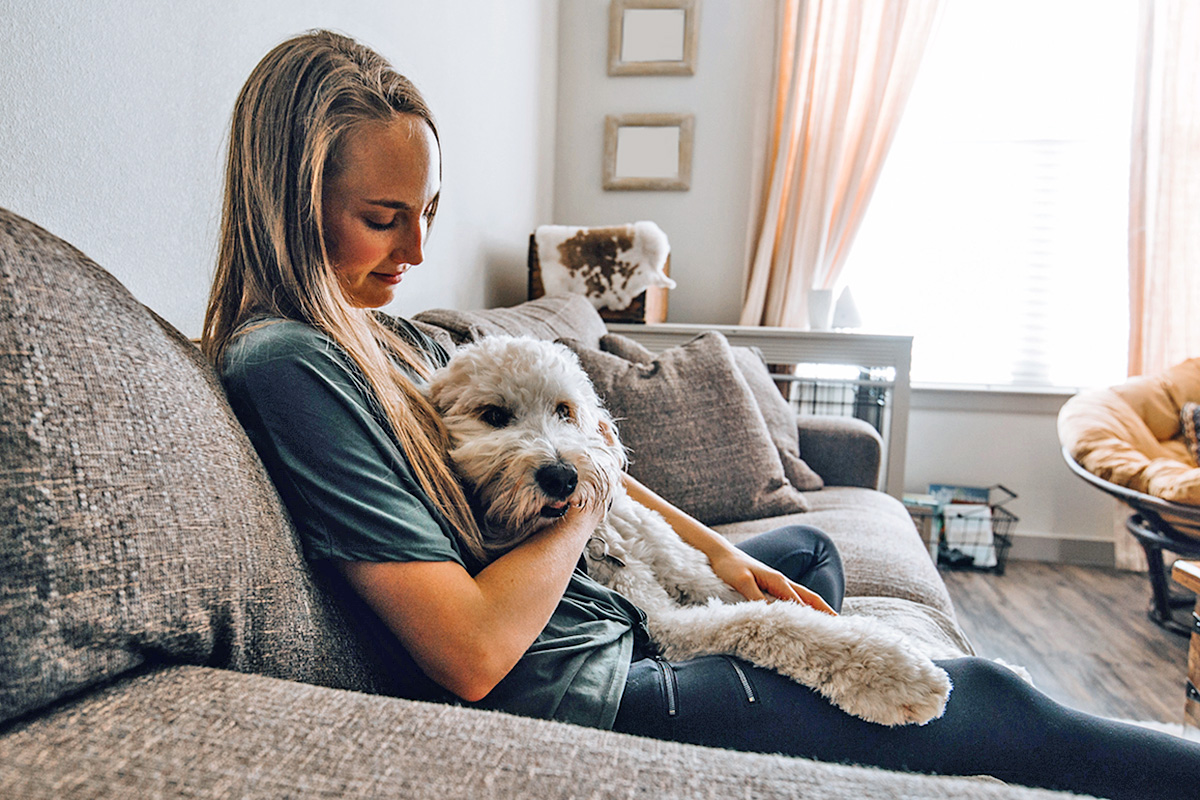 Person holding a dog