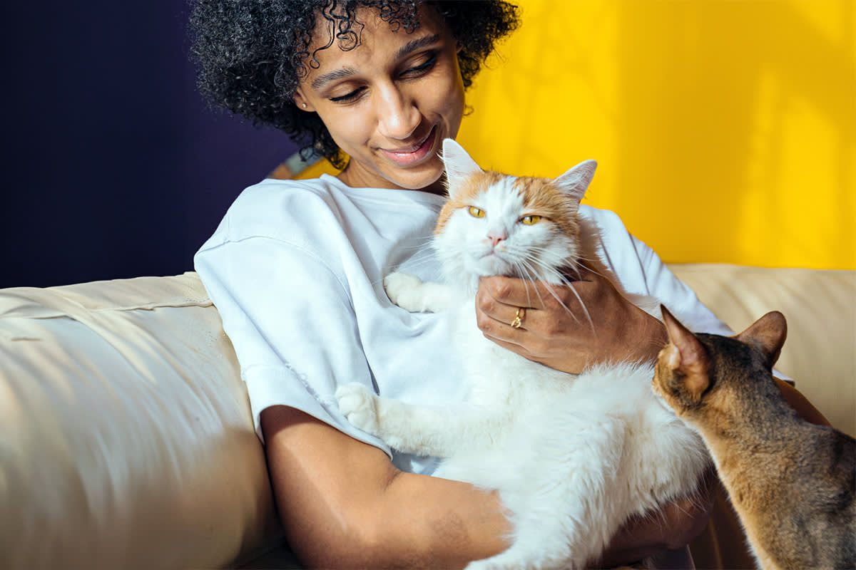 person with cat
