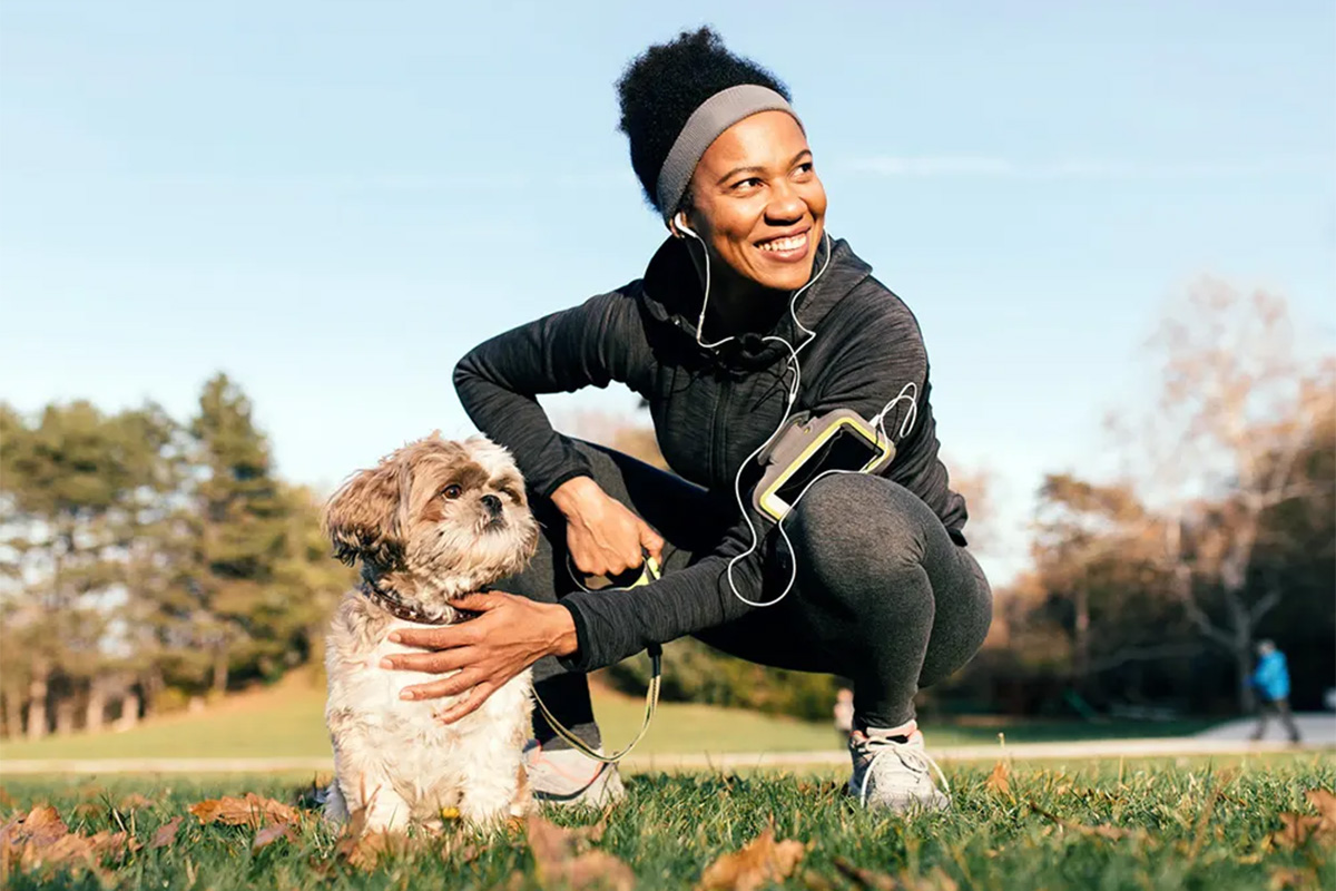 Person exercising with a dog