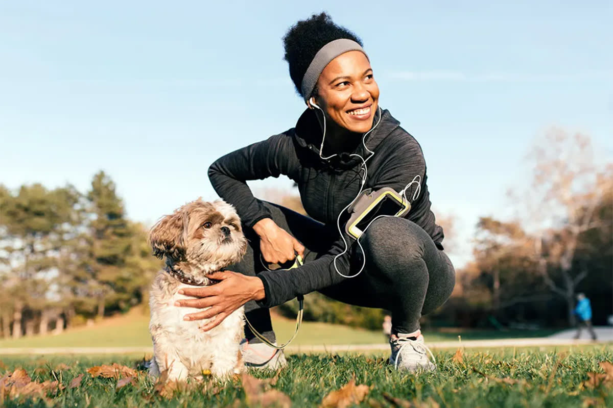 Person exercising with a dog