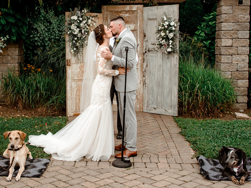 couple getting married with their dog