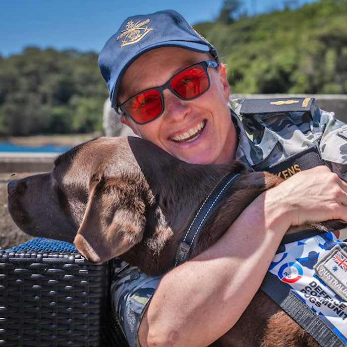 Taryn Dickson and her service dog, Gigi