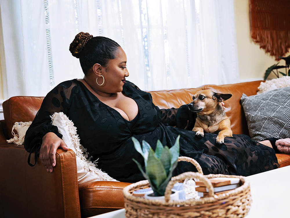 Ashley Nicole Black and her small dog, Gordi 