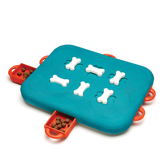 interactive dog toy in blue with white bones and orange treat pockets