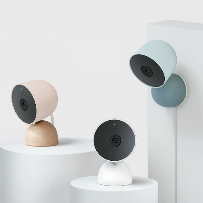 three google nest cams in blush, white, and pastel blue
