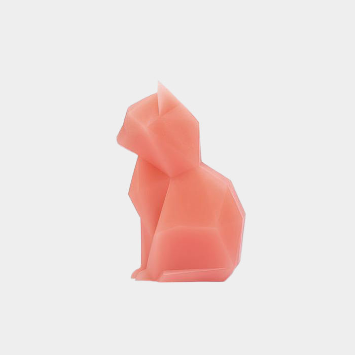 pink candle shaped like a cat