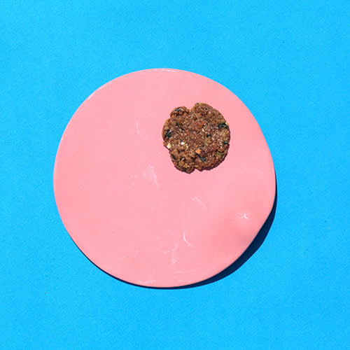 cookie on blue and pink backdrop