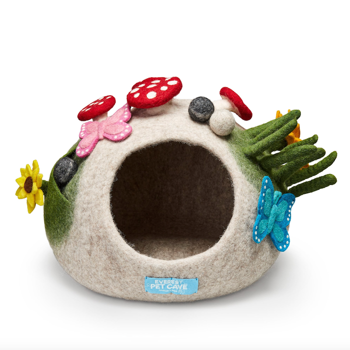 felted cat cave with garden flowers mushrooms and butterflies on