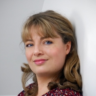 a headshot of a woman with blonde hair
