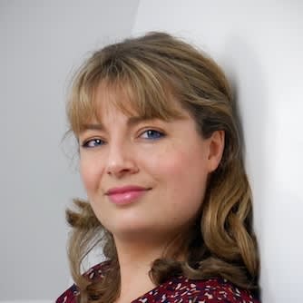 a headshot of a woman with blonde hair