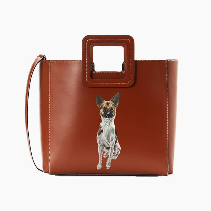 brown leather bag with custom dog portrait painting