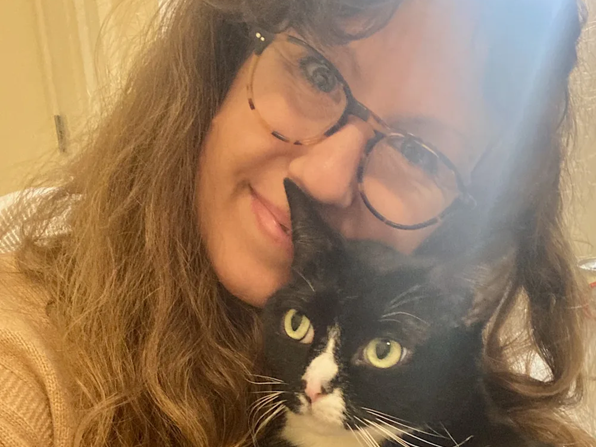 Writer Elizabeth Nelson with her cat, Freddy