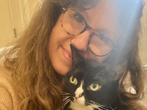 Writer Elizabeth Nelson with her cat, Freddy
