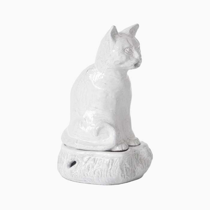 the incense burning cat in white