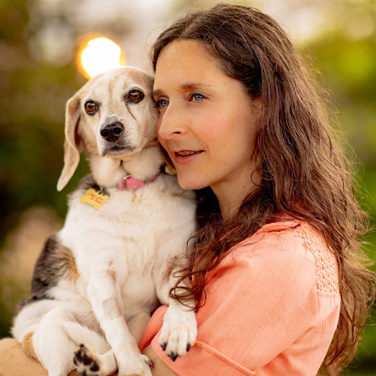 Katya Lidsky holds a dog