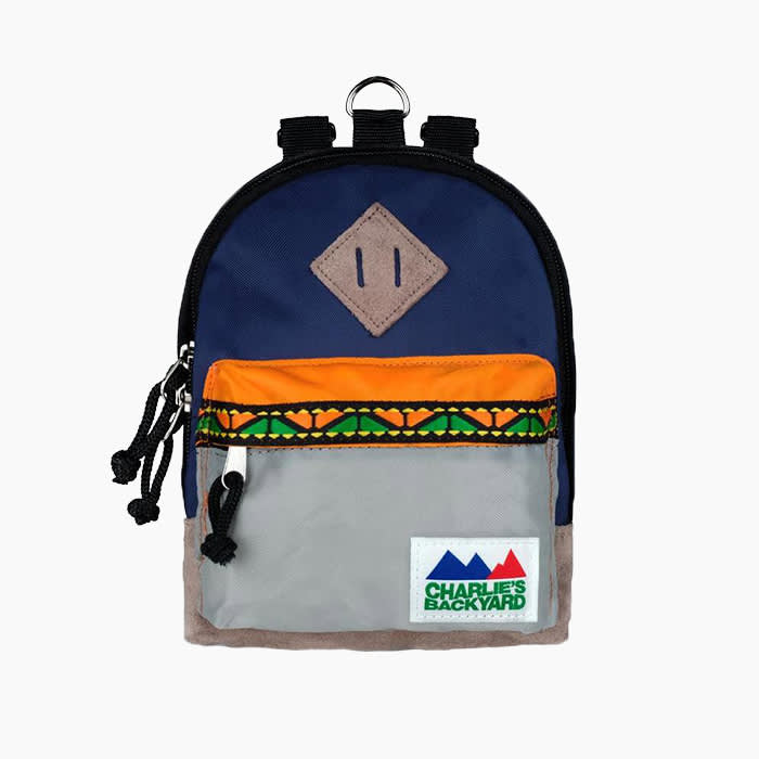 backpack in navy and grey and orange