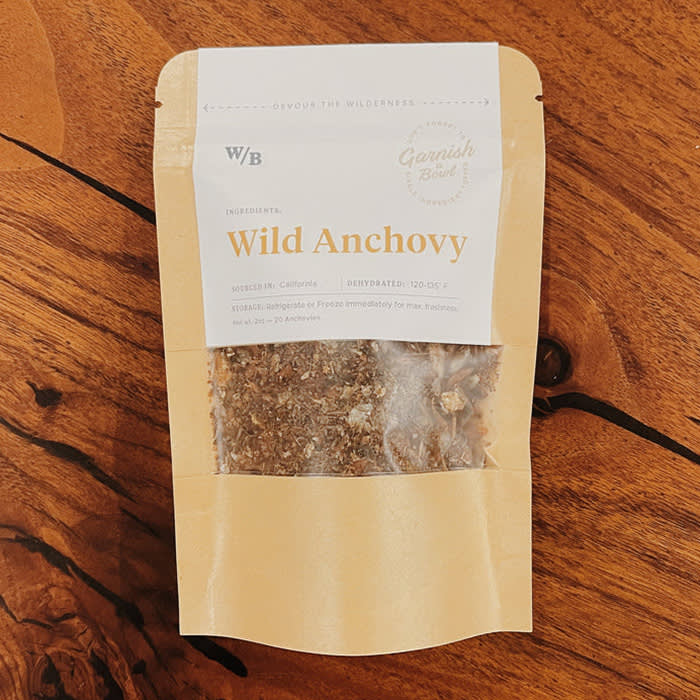 wild anchovy's food topper in brown paper pouch
