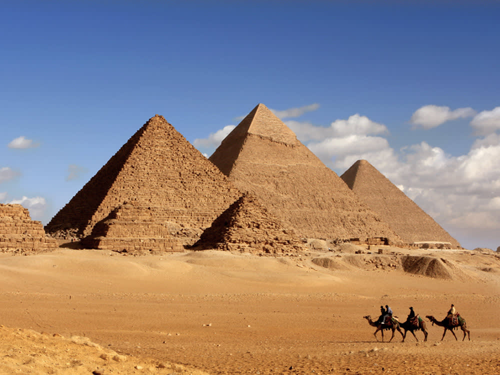 Man Flying Over Pyramids of Giza Spots Dog at the Top of 455ft Summit.