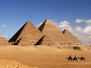 Man Flying Over Pyramids of Giza Spots Dog at the Top of 455ft Summit.