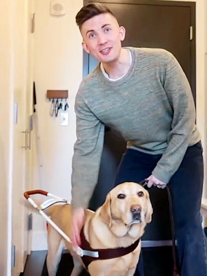 Paul Castle with his service dog