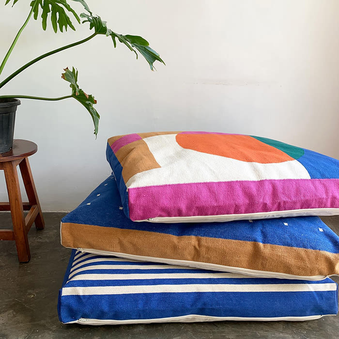 colorful dog bed stacked