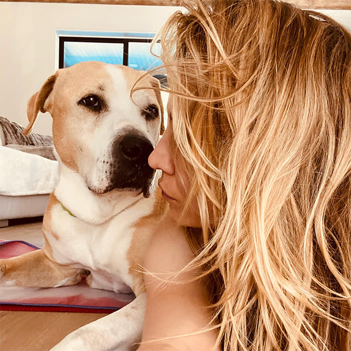 Kaley Cuoco kisses her late dog Norman