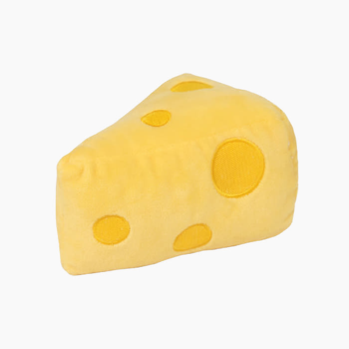 the block of cheese toy in yellow