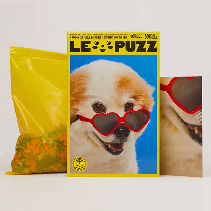 le puzz puzzle box, a dog wearing two heart sunglasses