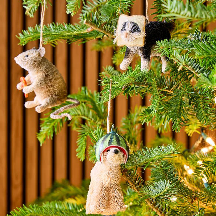 three pet ornaments on a Christmas tree