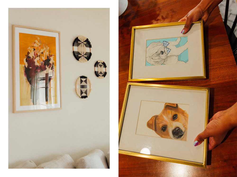 a framed floral painting; two framed paintings of dogs 