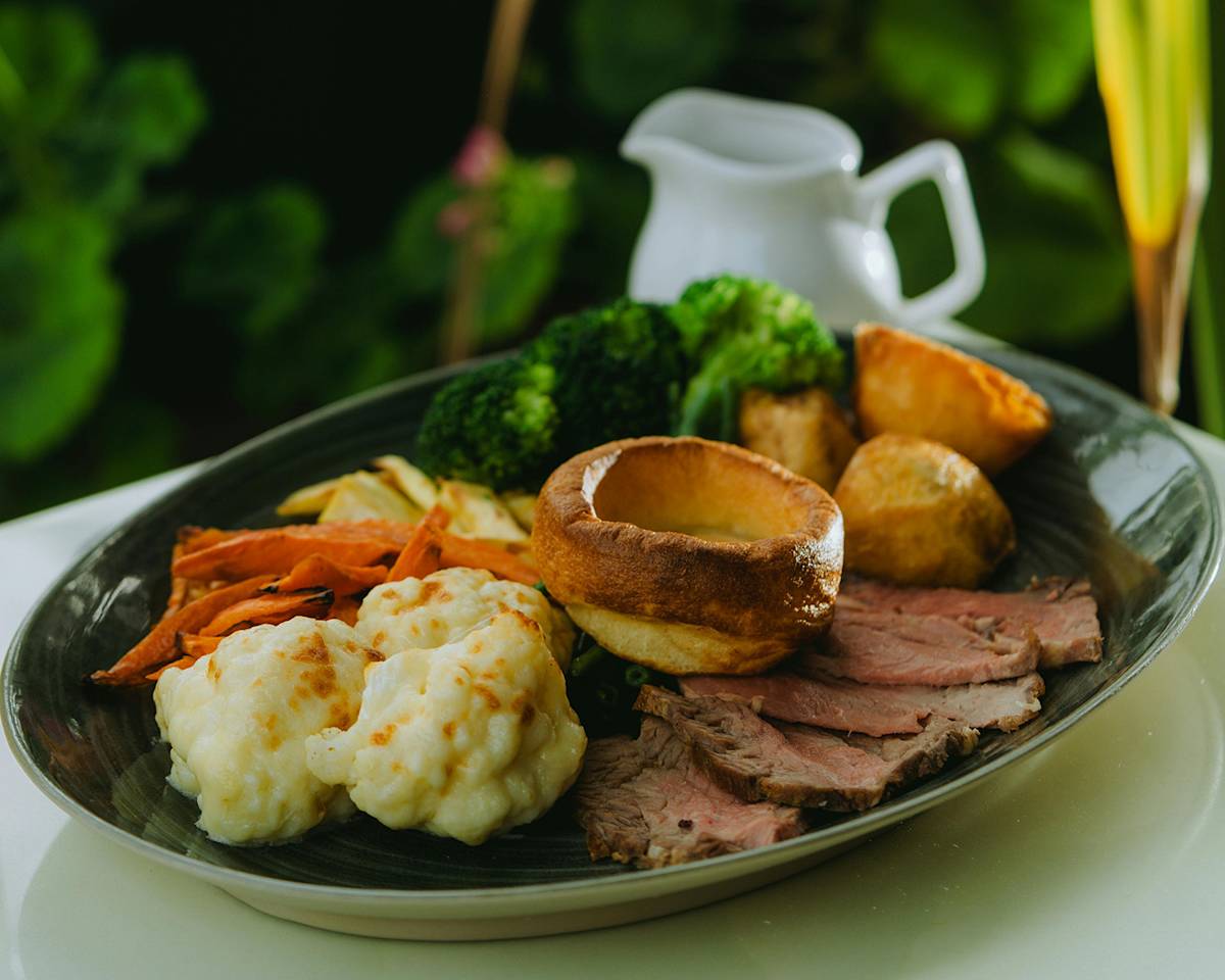 yorkshire puddings on a plate of sunday roast