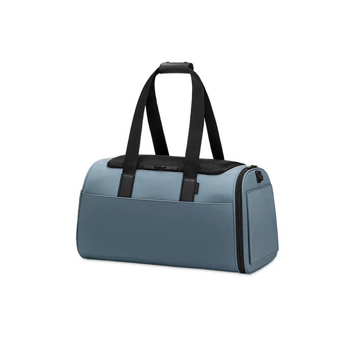 the pet carrier in blue and black