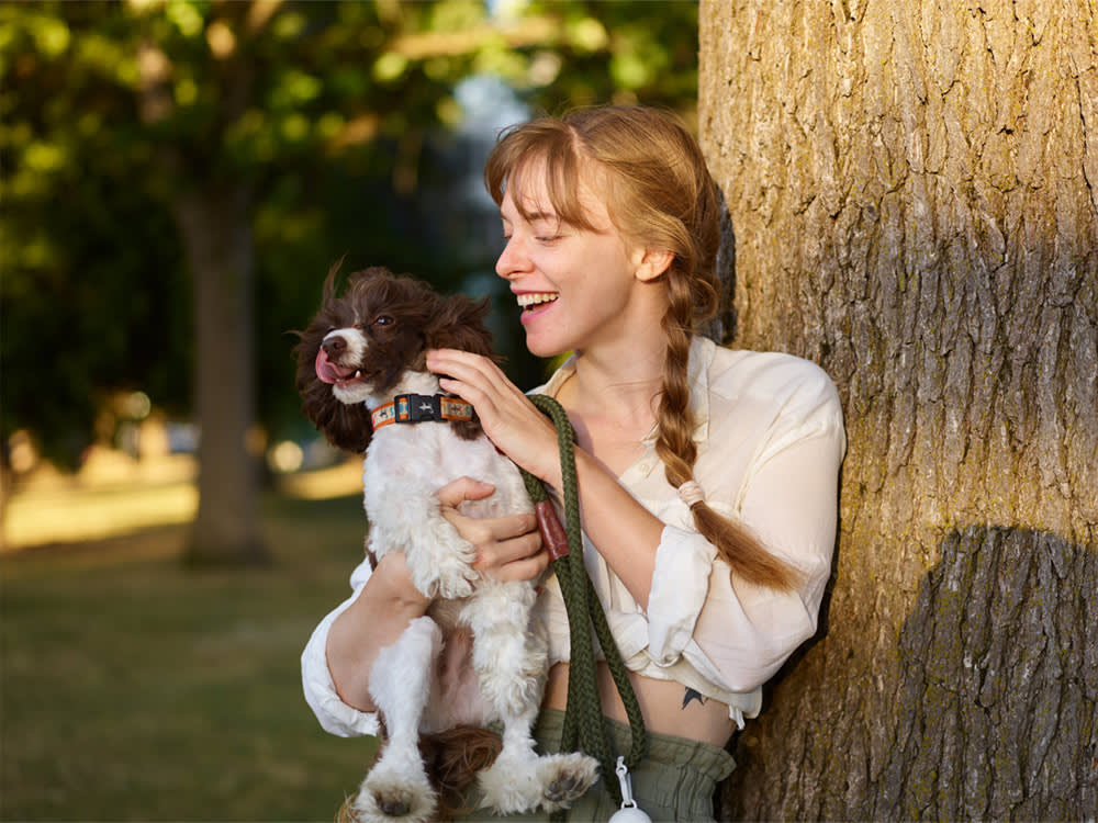 Woman spending time with dog