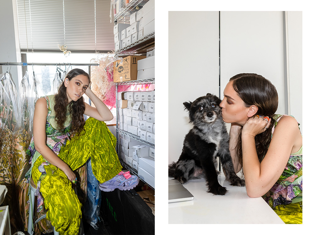 Hillary Taymour; Hillary Taymour kissing the cheek of her small black dog