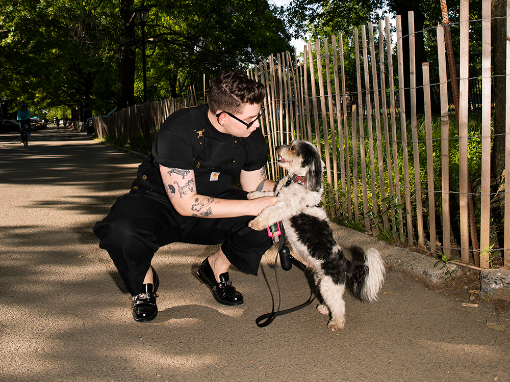 Zoe Schlacter with their small dog 